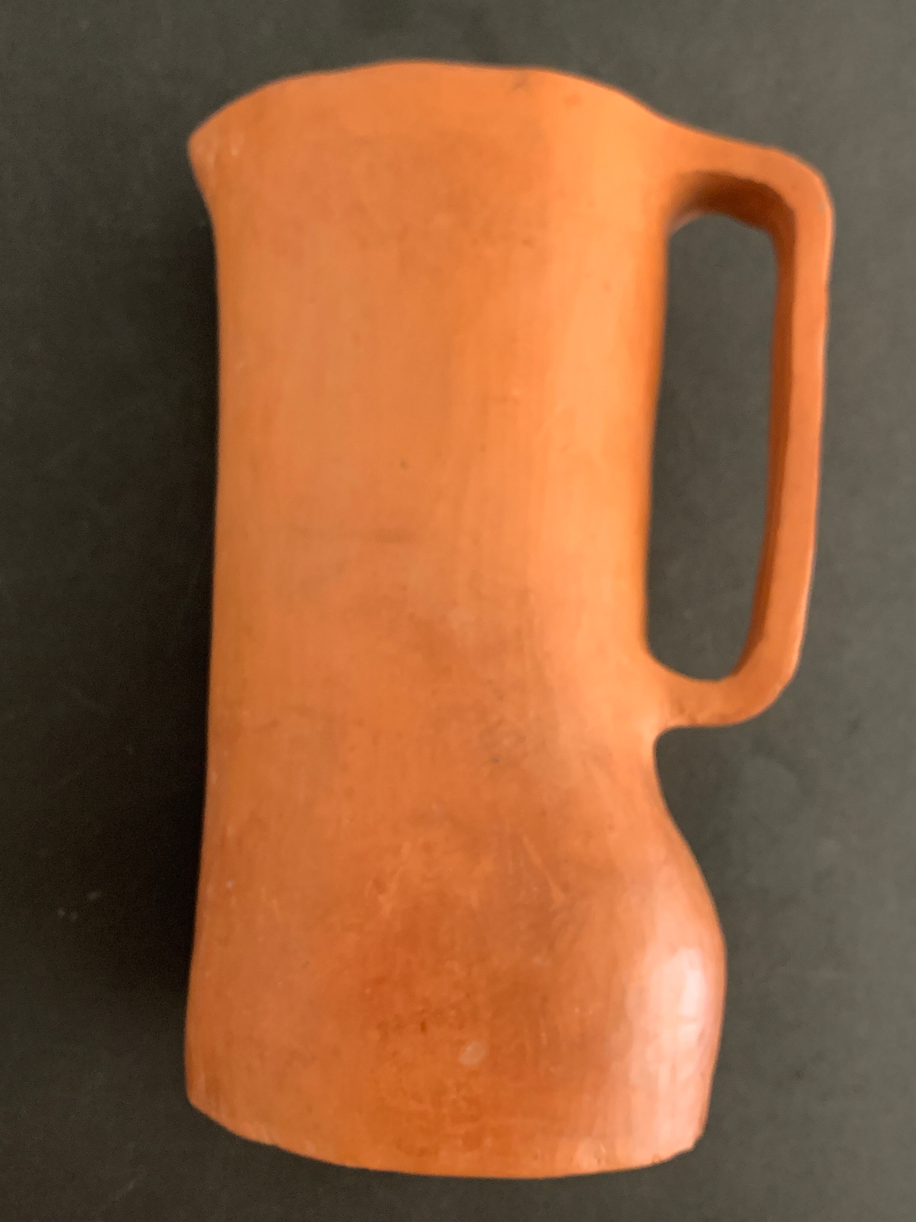 Signed terracotta pitcher or vase