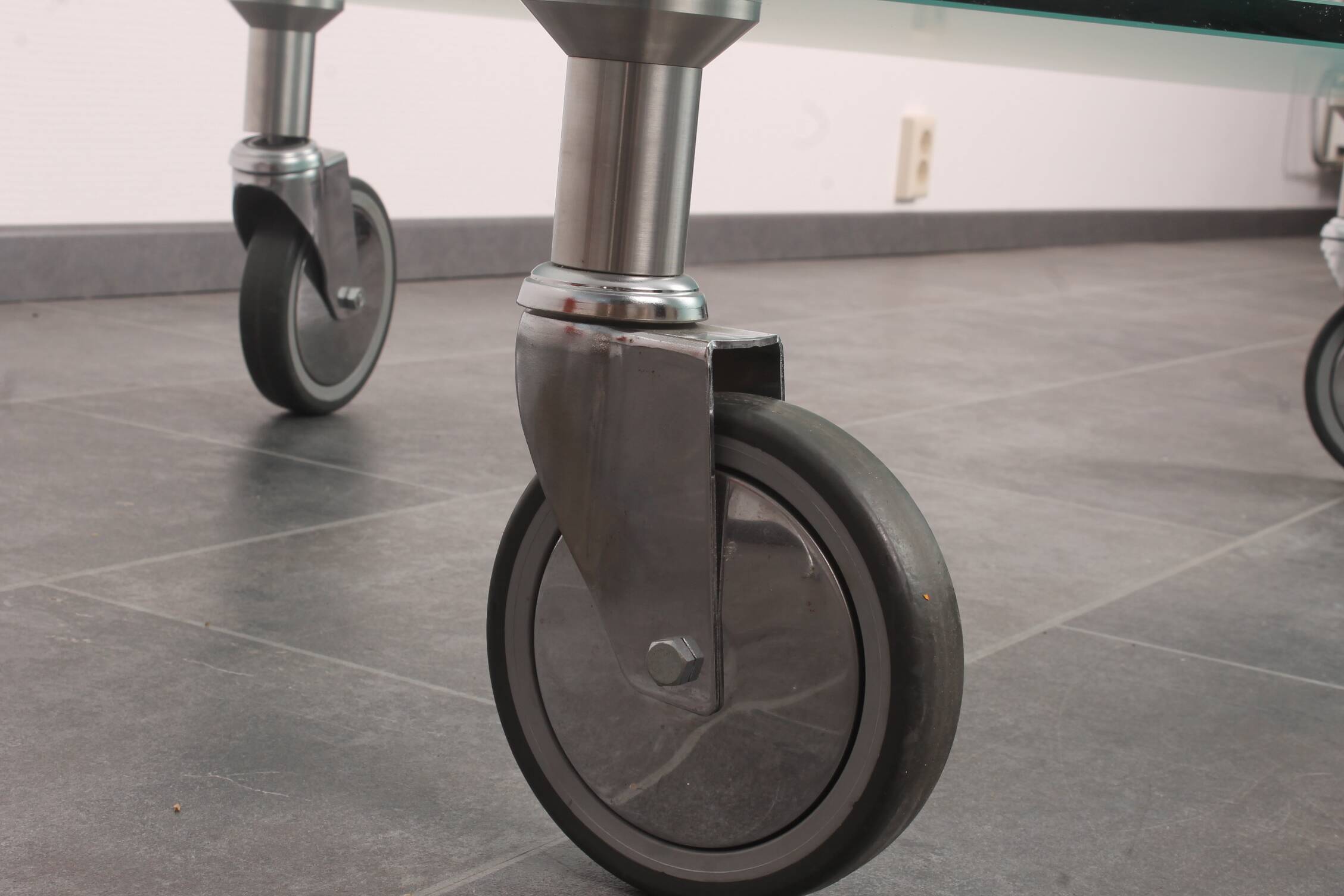 Wheeled glass coffee table