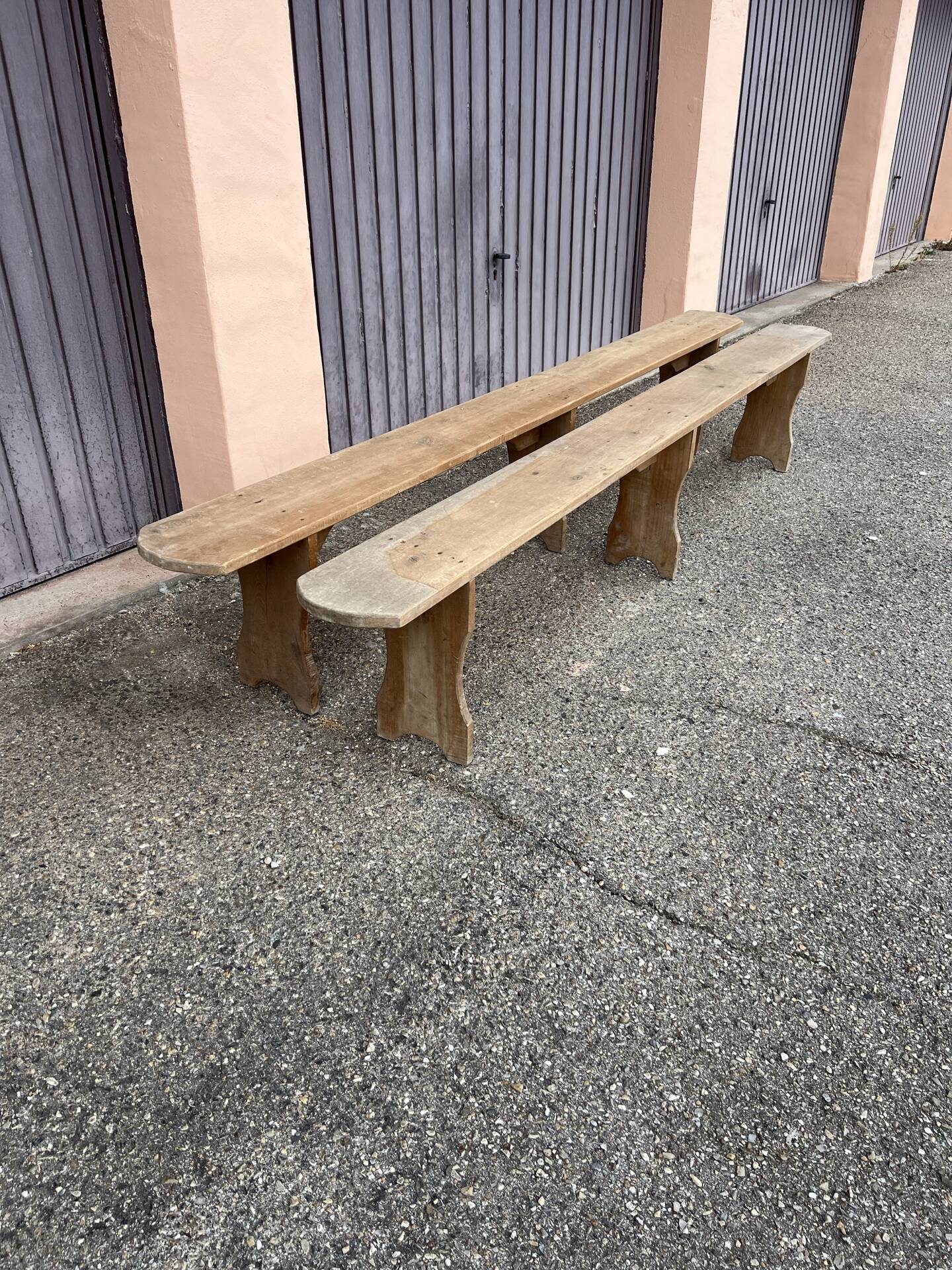 Pair of long benches in natural solid wood, French artisanal craftsmanship.