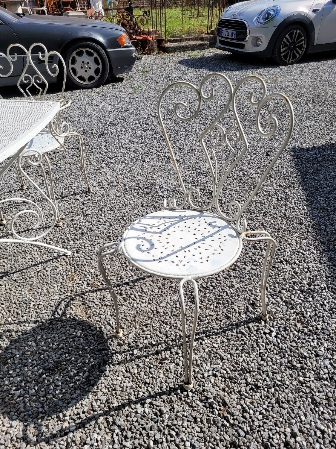 Old wrought iron garden furniture, table + 2 armchairs + 2 chairs