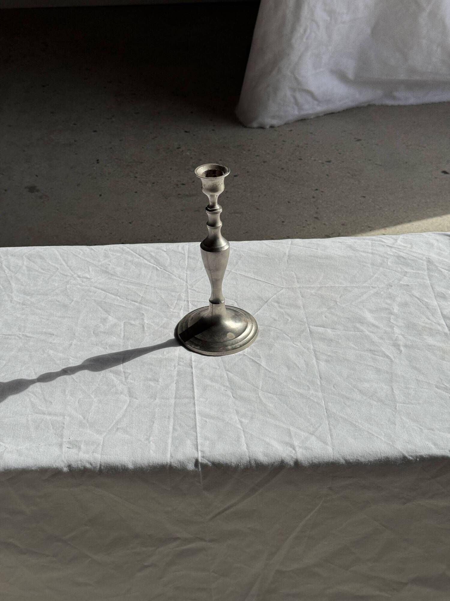 Antique silver-plated candlestick with a baluster shaft H21 D9.5