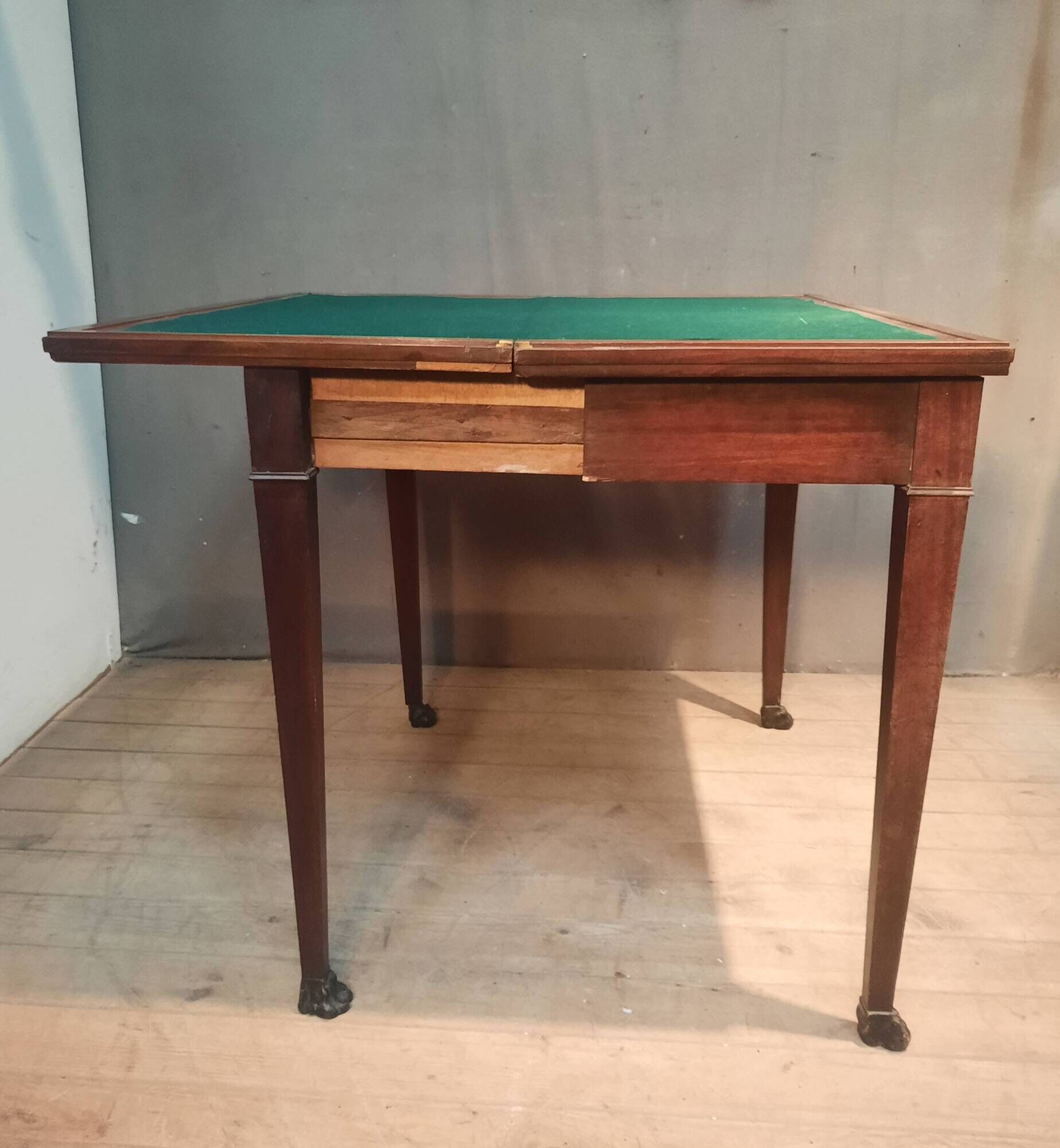 Rectangular console that transforms into a game table.