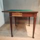 Rectangular console that transforms into a game table.