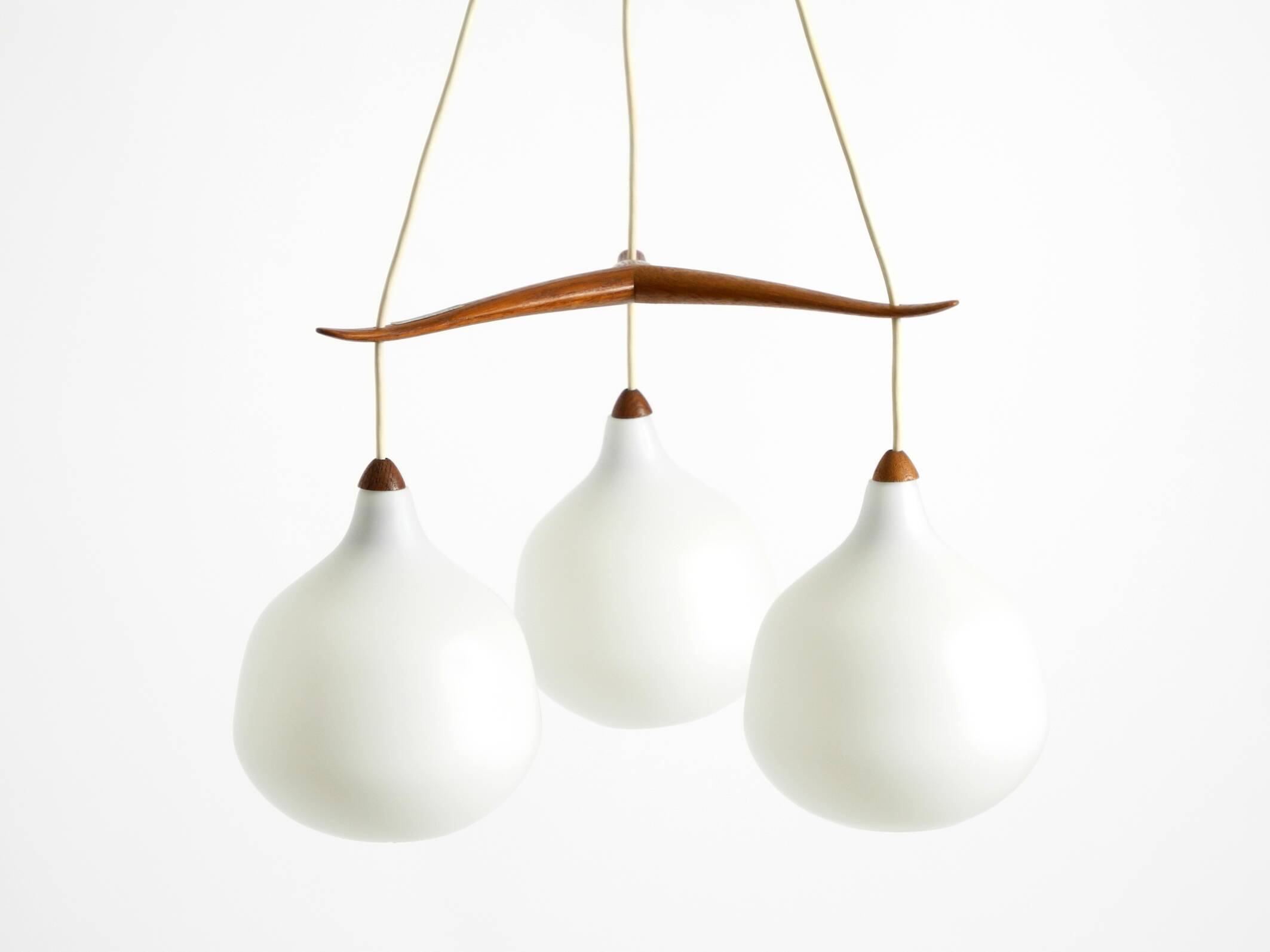 Pendant lamp with opal glass shades teak frame by Uno & Östen Kristiansson