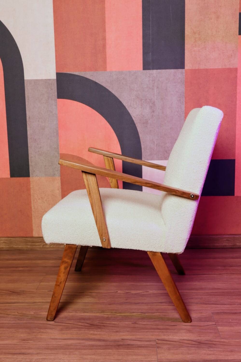 Vintage beige bouclé armchair with walnut wood from the 1950s.