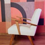 Vintage beige bouclé armchair with walnut wood from the 1950s.