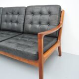 Senator sofa with black leather cushions by Ole Wascher for France and Son