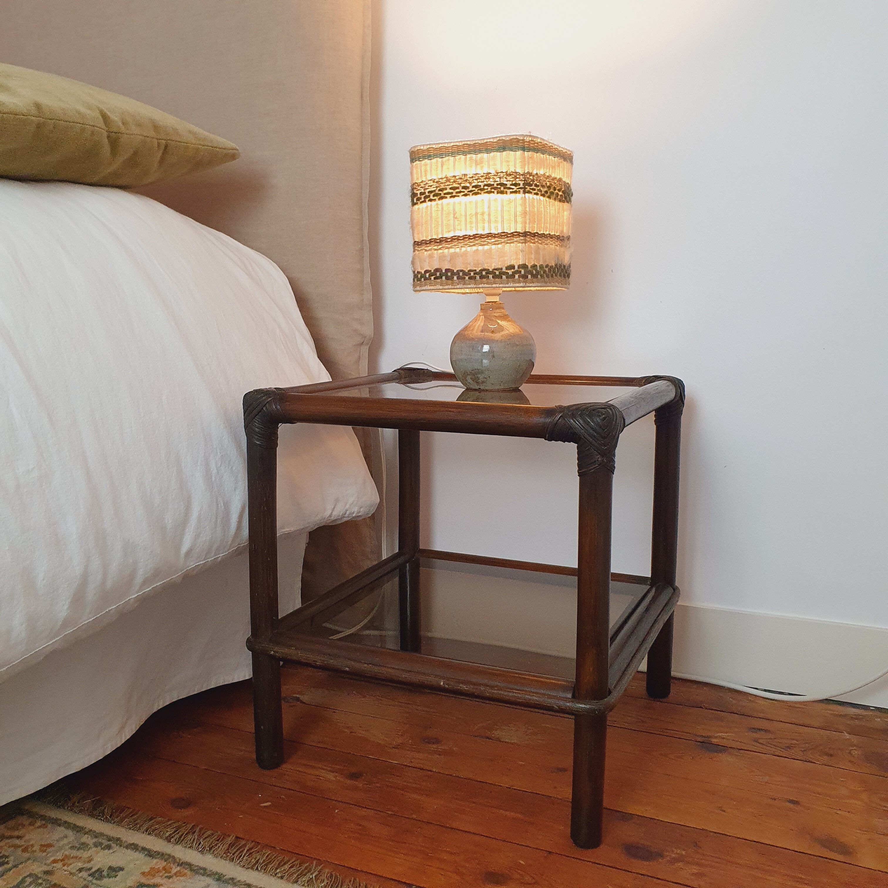 Rattan bedside and smoked glass