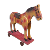 Old toy horse on wheels