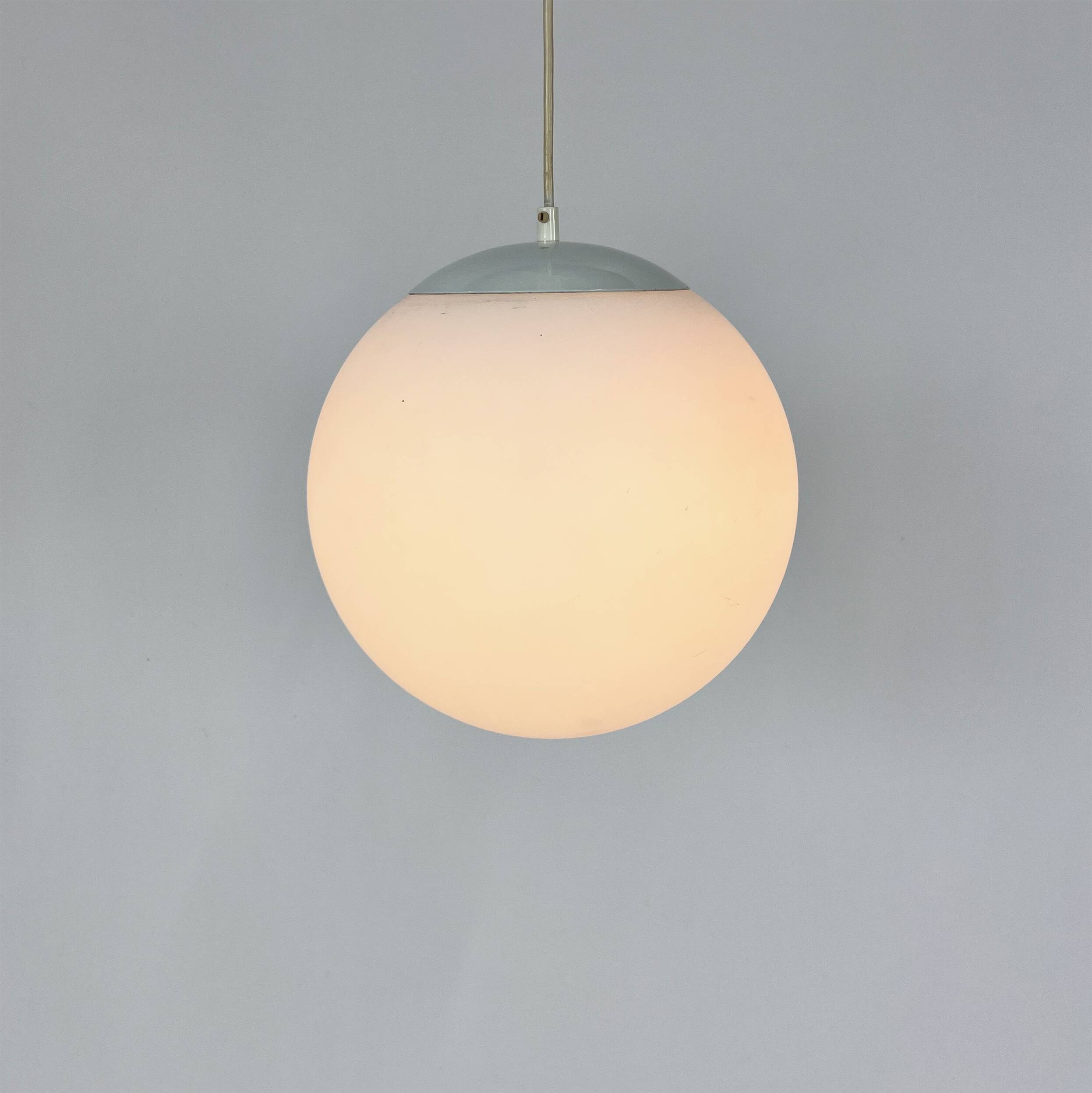 Vintage glass hanging ball lamp by hala zeist, 1960s