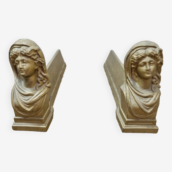 Cast iron andirons heads of women