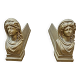 Cast iron andirons heads of women