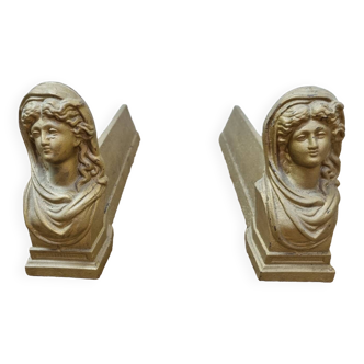 Cast iron andirons heads of women