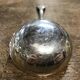 Small silver metal ladle from the Christofle brand, shell model