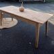Large antique farmhouse table with 2 drawers in raw solid wood.