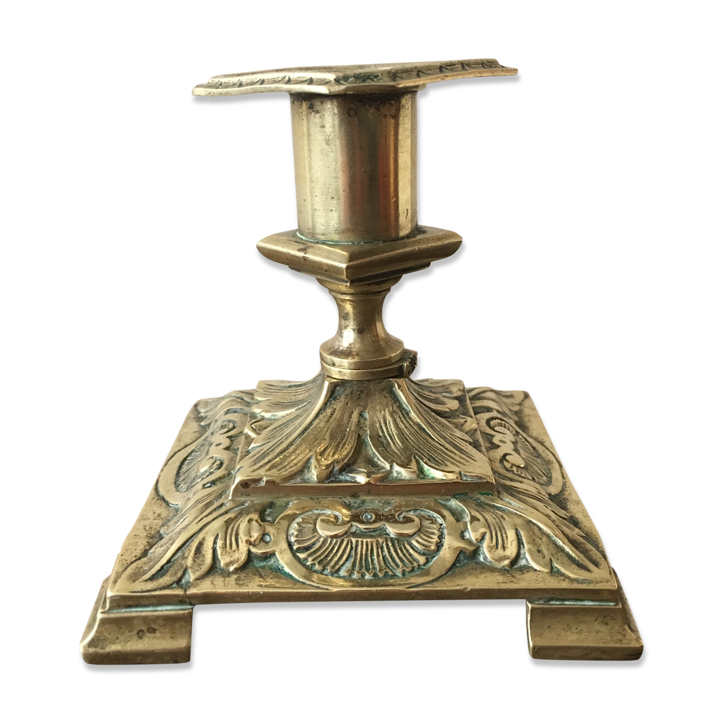 Old brass candle holder with square base