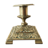 Old brass candle holder with square base