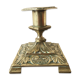 Old brass candle holder with square base