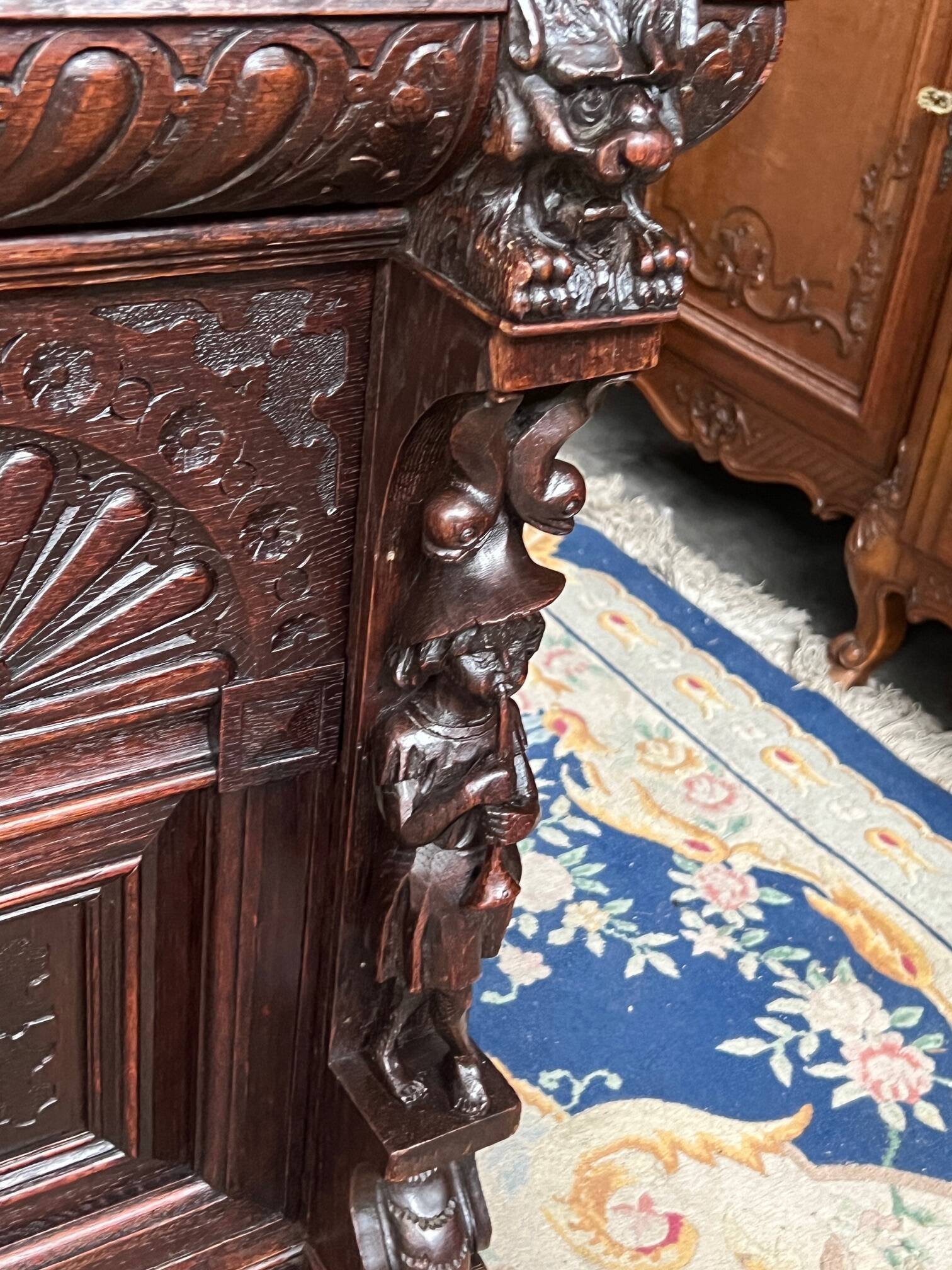 Old Renaissance style desk. Solid oak. France. Late 19th century.