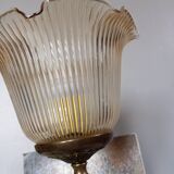Table lamp with brass base, grooved transparent globe, vintage