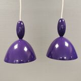 Two purple hanging lamps from Norway Says for Muuto, model Mhy