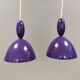 Two purple hanging lamps from Norway Says for Muuto, model Mhy