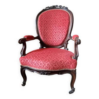 Napoleon III medallion armchair in carved wood and red velvet.