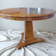 Table ronde extensible en loupe de bois aux magnifiques veinage