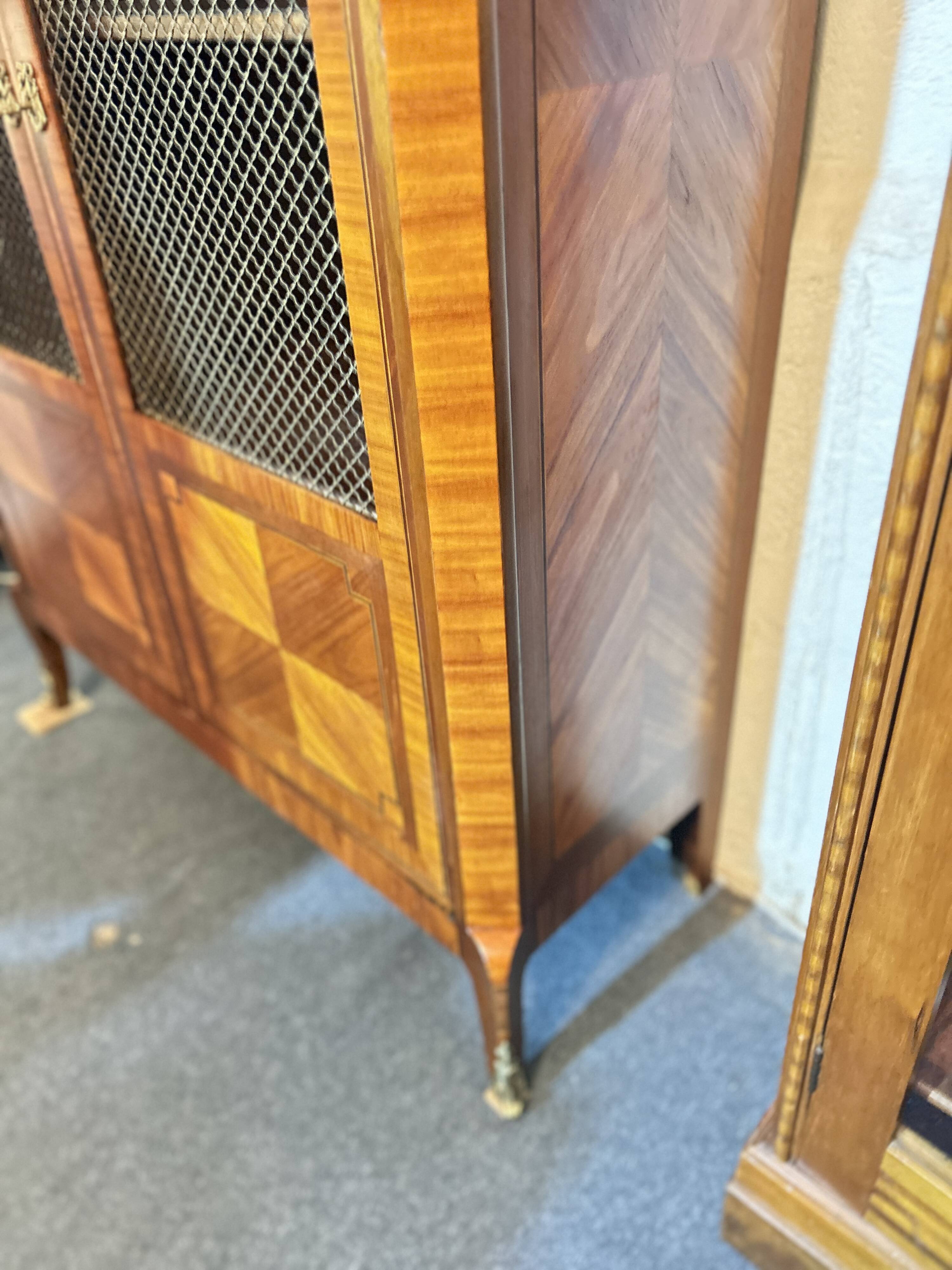 Directoire style display cabinet with two doors