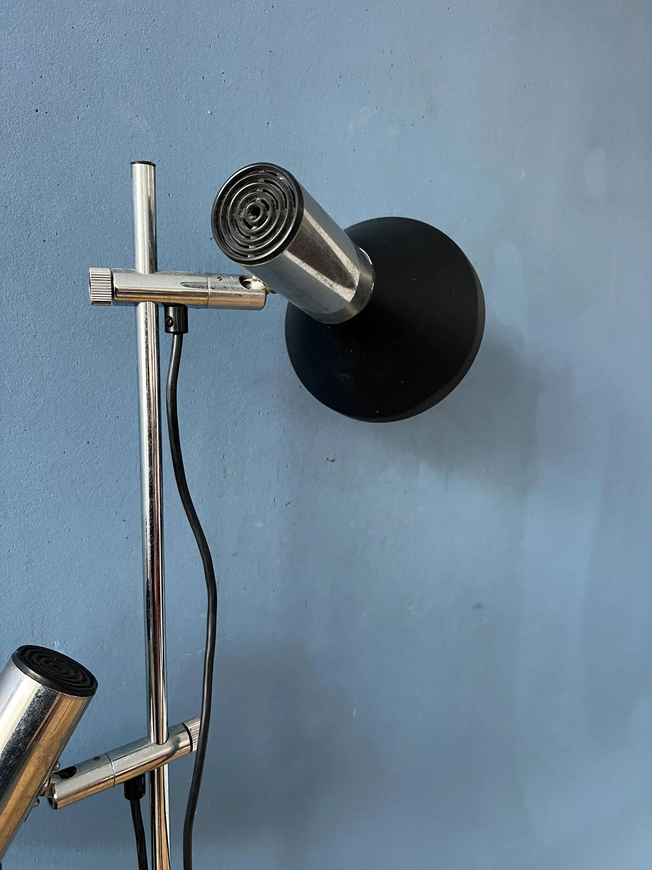 Mid-century black vintage floor lamp with two aluminium spots.