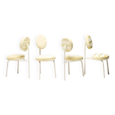 Quatre chaises "Champagne" de Piet Hein Eek - Un design néerlandais avec âme et histoire.