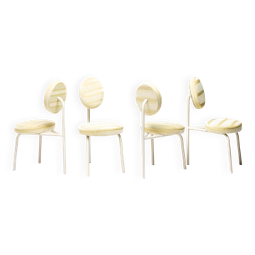 Quatre chaises "Champagne" de Piet Hein Eek - Un design néerlandais avec âme et histoire.