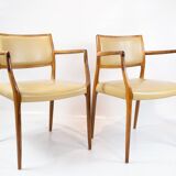 Pair of N.O. Moeller armchairs, model 65, in rosewood and light leather