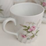 Haviland Limoges porcelain 10 coffee cups and 9 saucers with floral decoration.