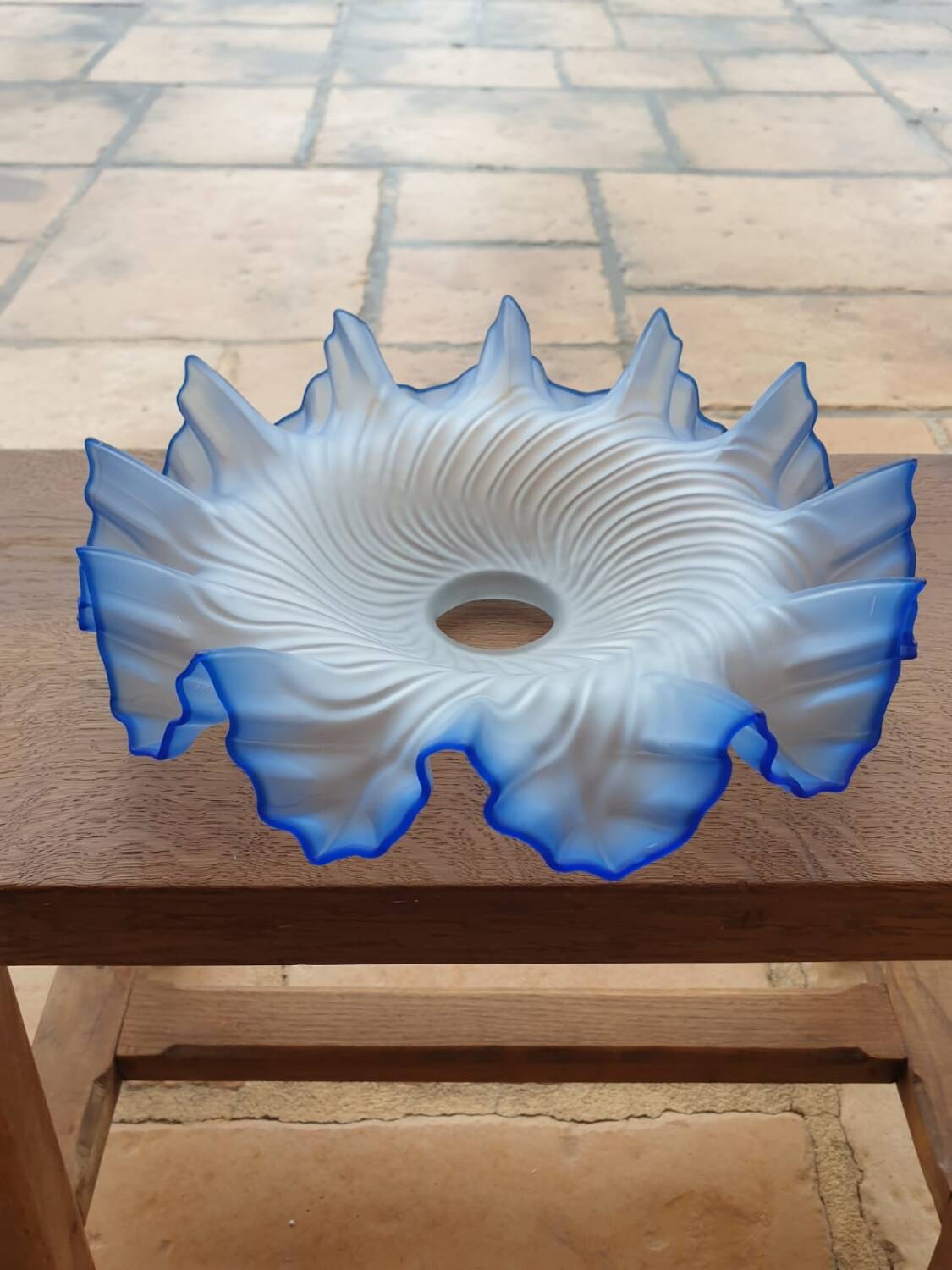 White and blue skirted opaque glass lampshade