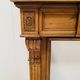 Louis XVI style fireplace in solid fir, 19th century.