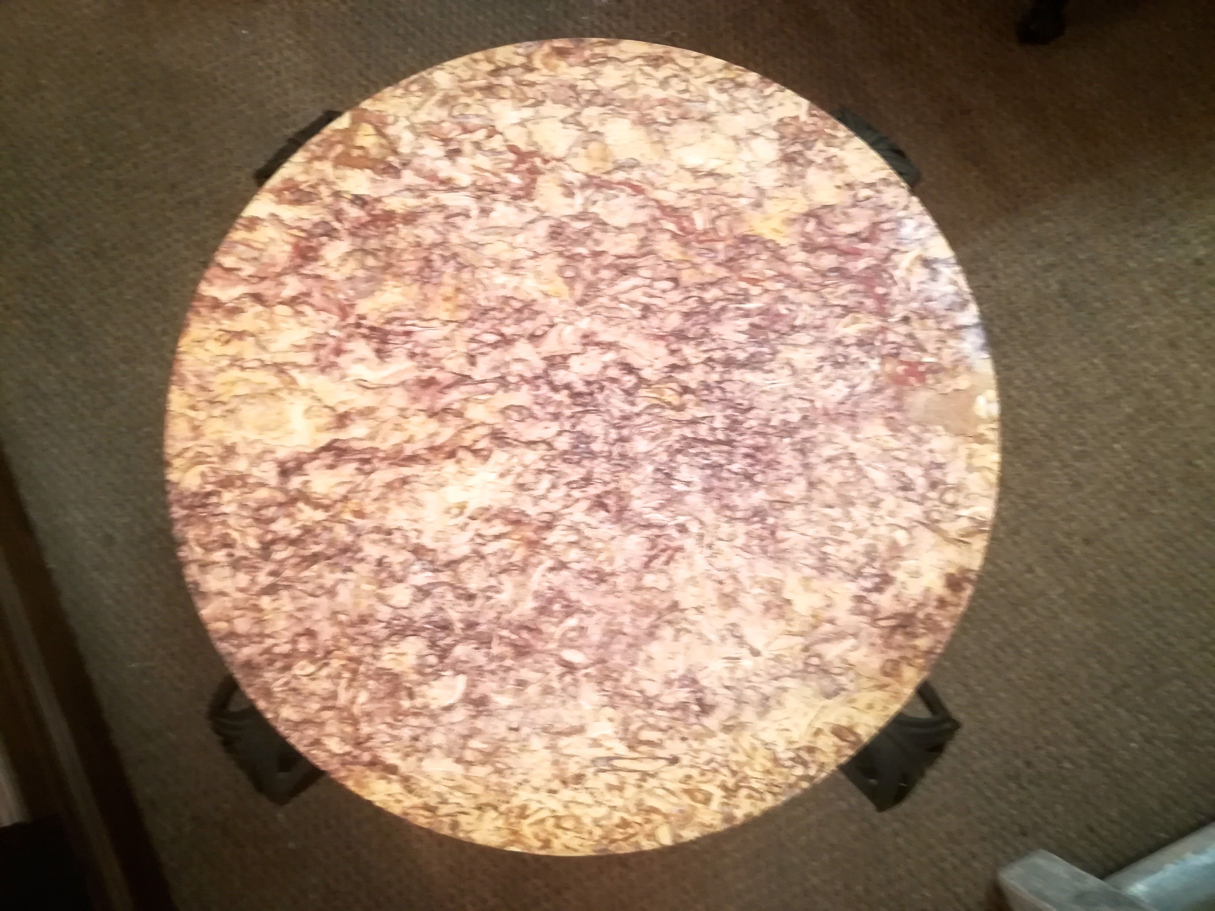 Wrought iron and marble coffee table