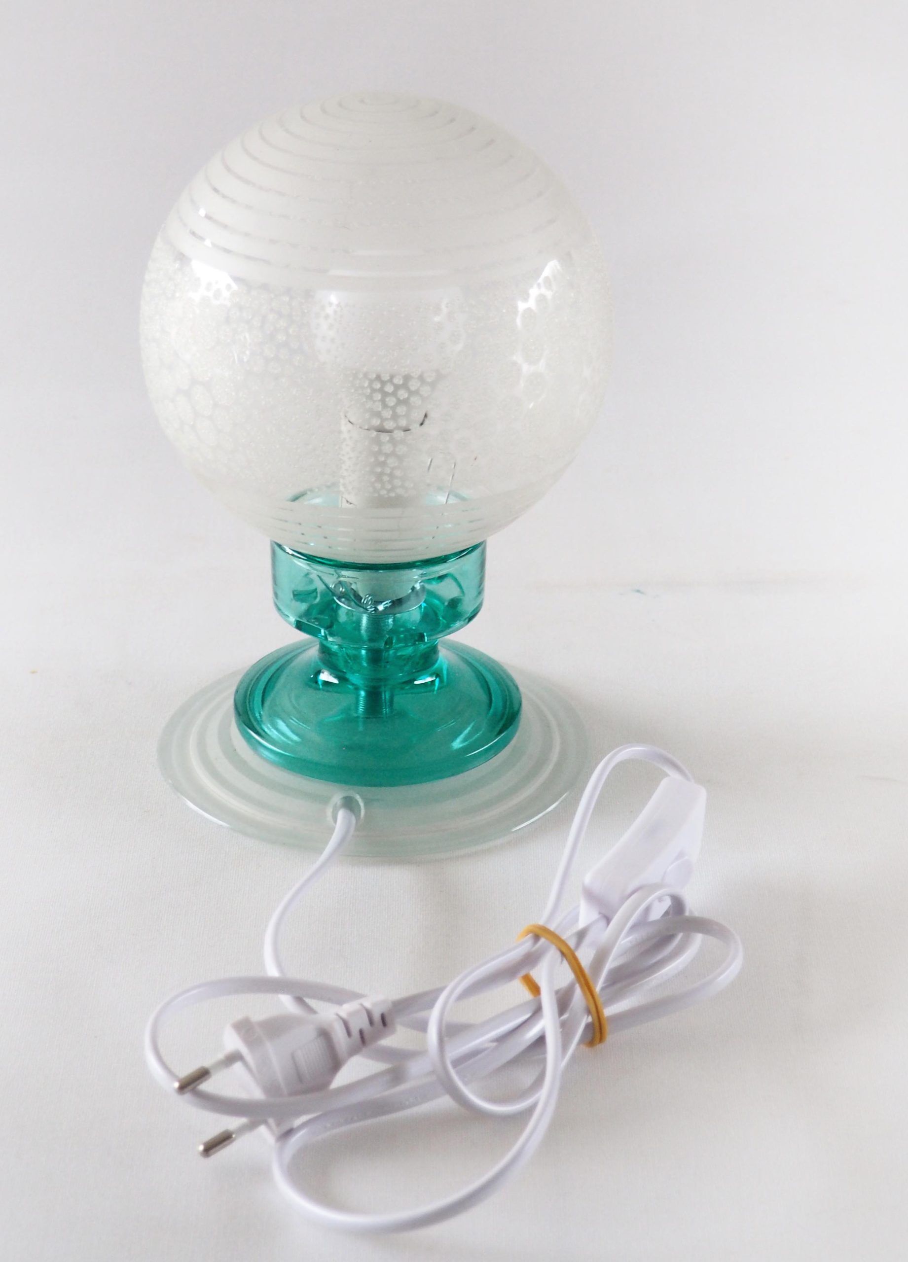 Frosted globe lamp and turquoise glass