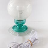 Frosted globe lamp and turquoise glass