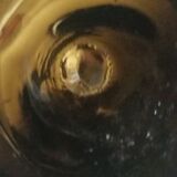 Old bottle made of blown glass
