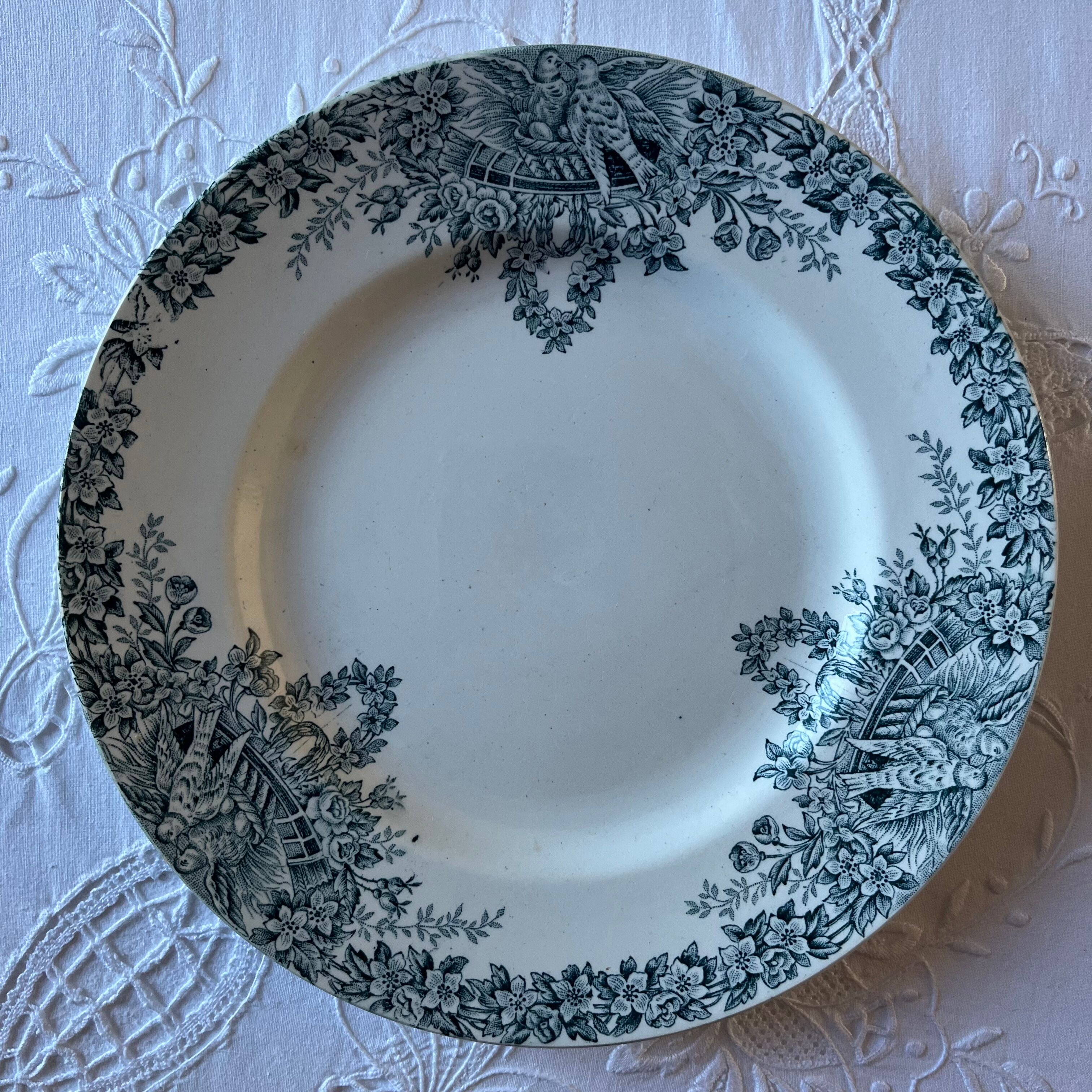 4 iron earth plates decorated with birds