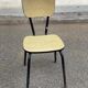 Yellow formica and black steel chair from the 1970s.