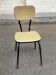 Yellow formica and black steel chair from the 1970s.