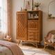 Rattan wardrobe with tapered legs from the 1960s.