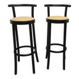 Pair of Baumann Dialog model stools in black and yellow and blue imitation leather, 1990