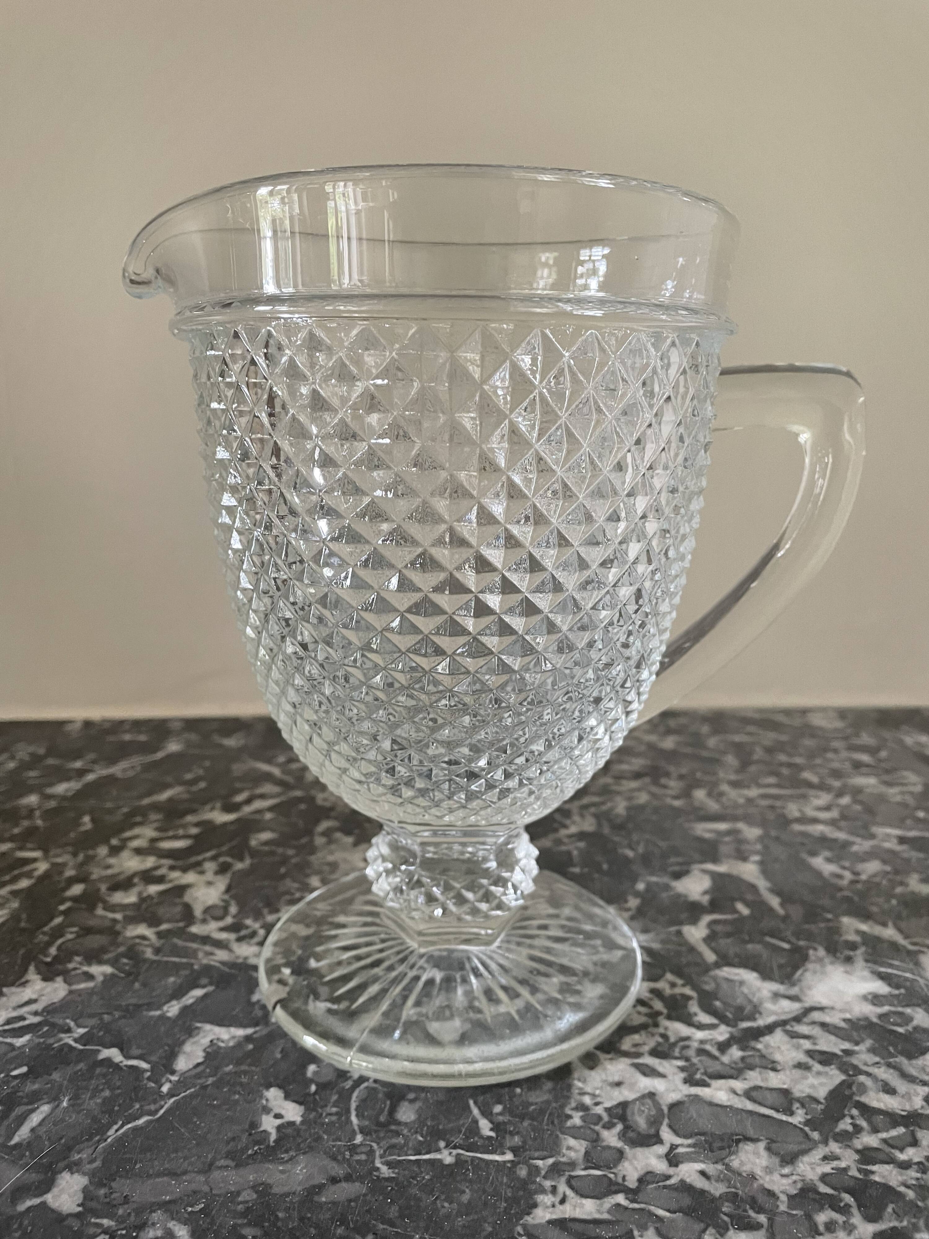 Pitcher on diamond point stand