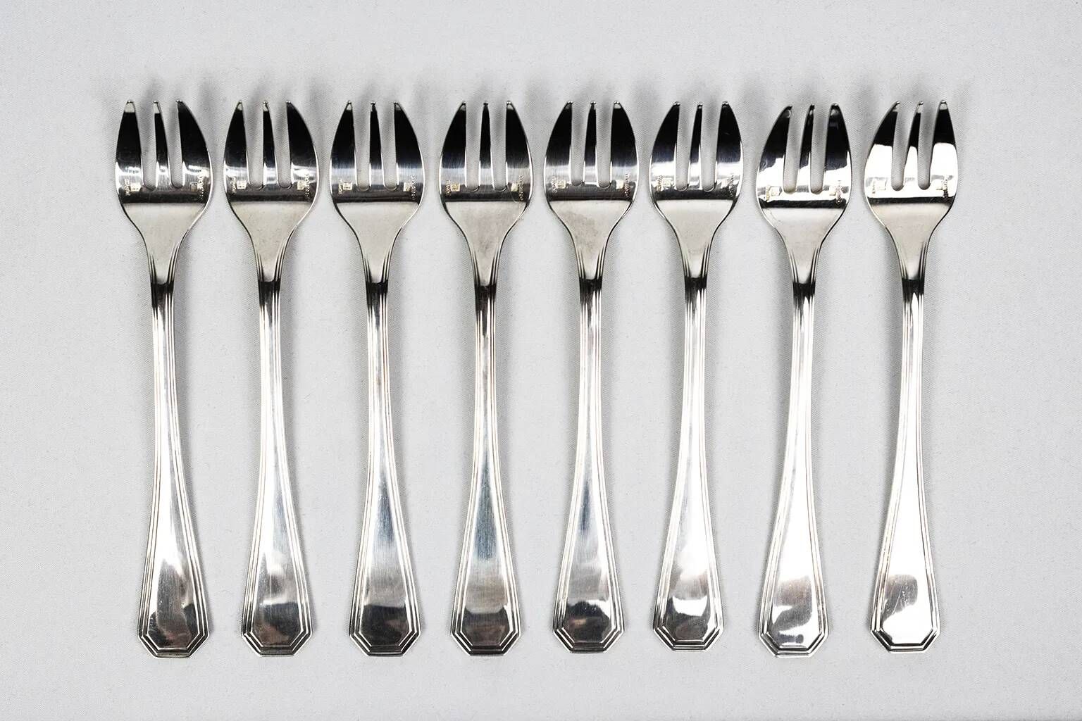 8 Christofle America silver-plated oyster forks, Luc Lanel