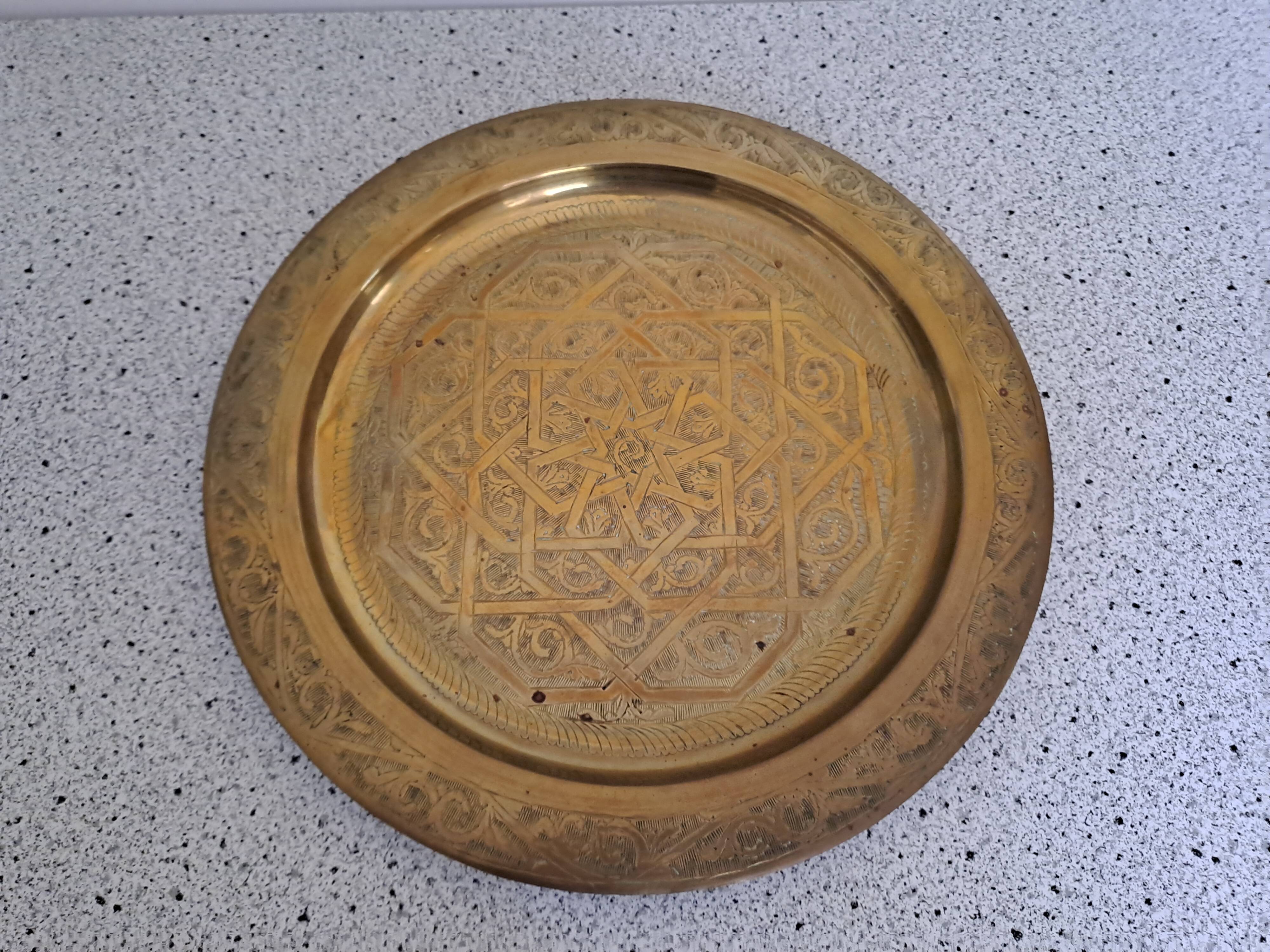 Large chiseled metal plate