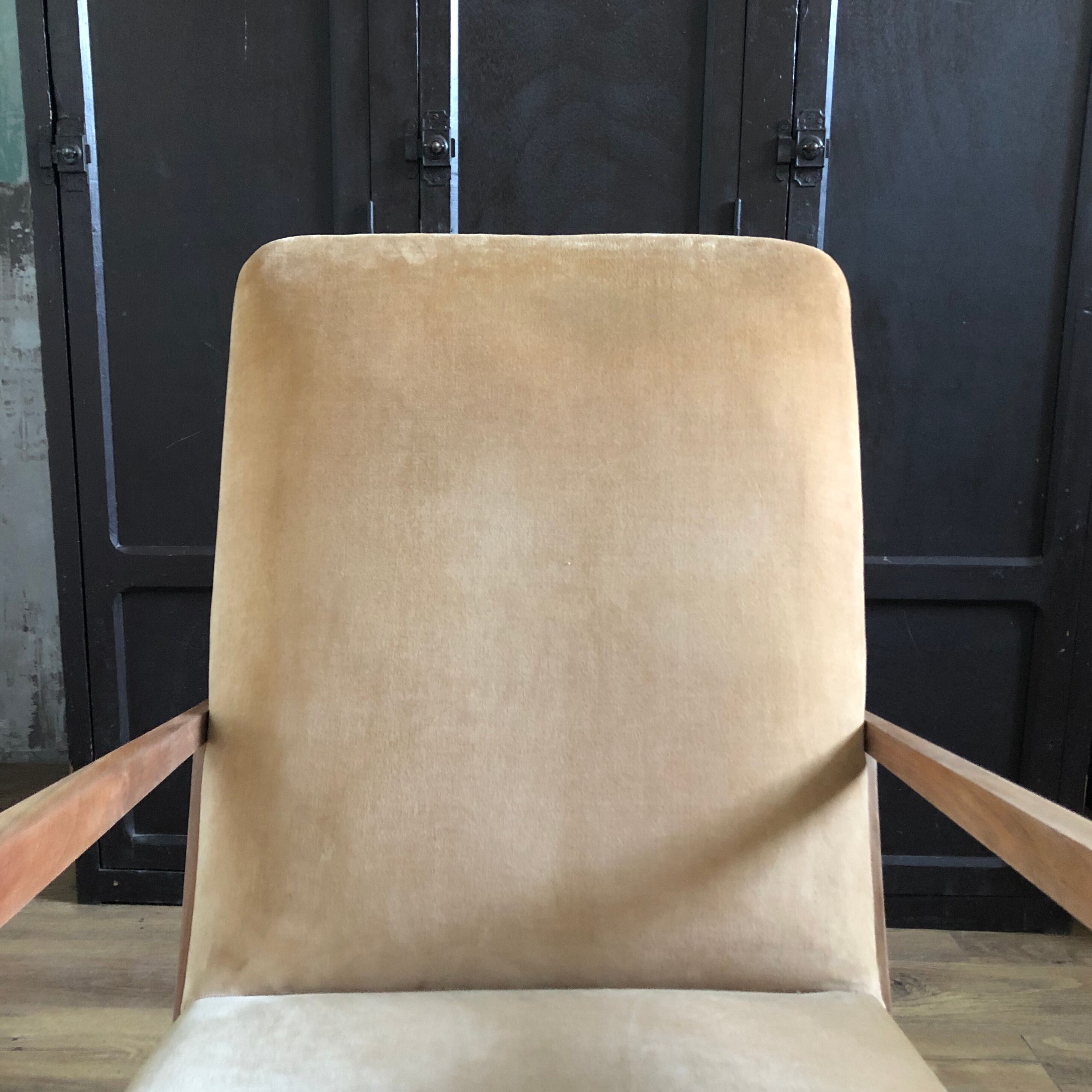 Velvet and wood armchair