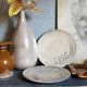 Duo of ceramic plates decorated with vintage foliage